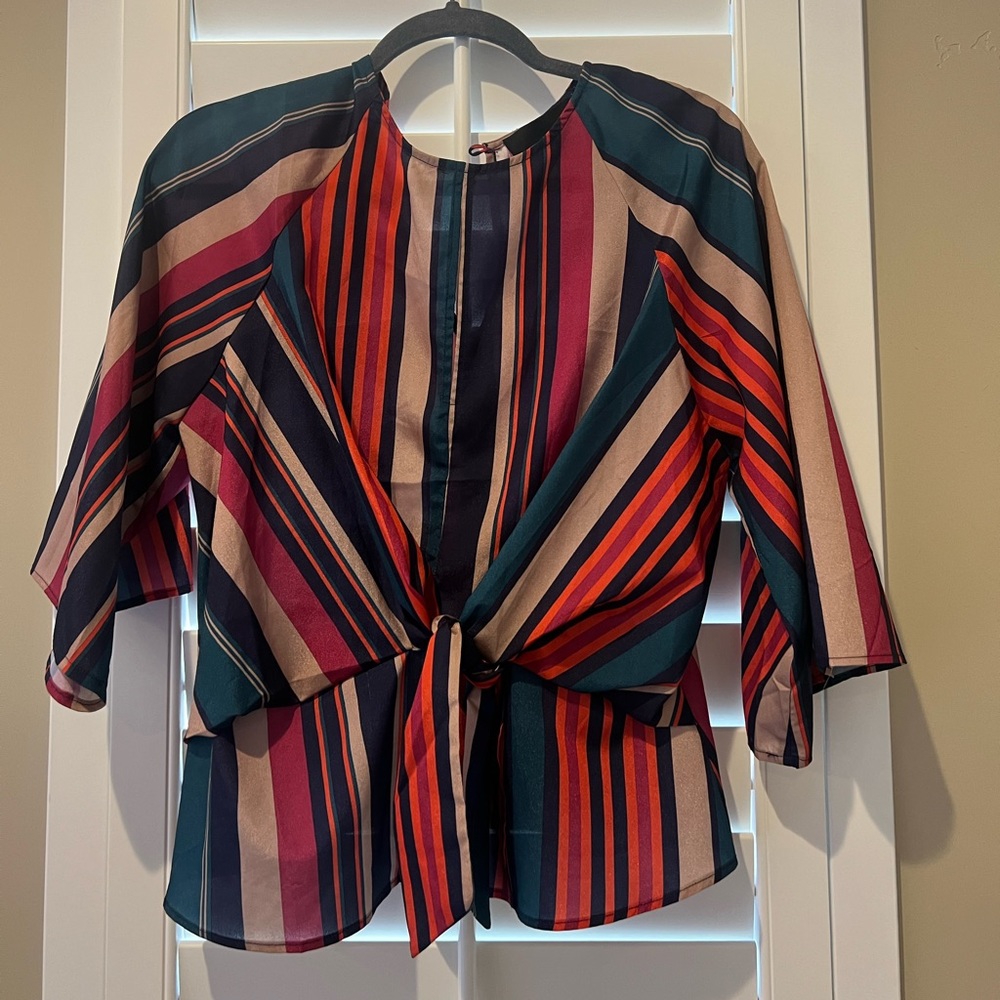 Multi striped tie front peplum blouse